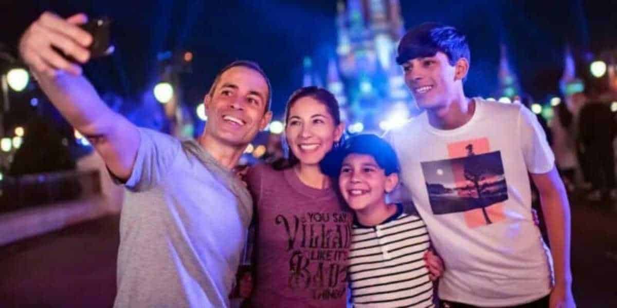 Family taking a selfie on Disney Parks