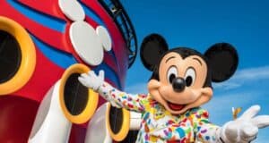 Mickey Mouse with a Disney Cruise Line ship