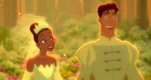 An animated princess and prince are smiling joyfully in a lush, sunlit forest. The princess wears a sparkling green gown and tiara, while the prince is dressed in a matching outfit. Flowers and soft light surround them, creating an enchanting atmosphere.