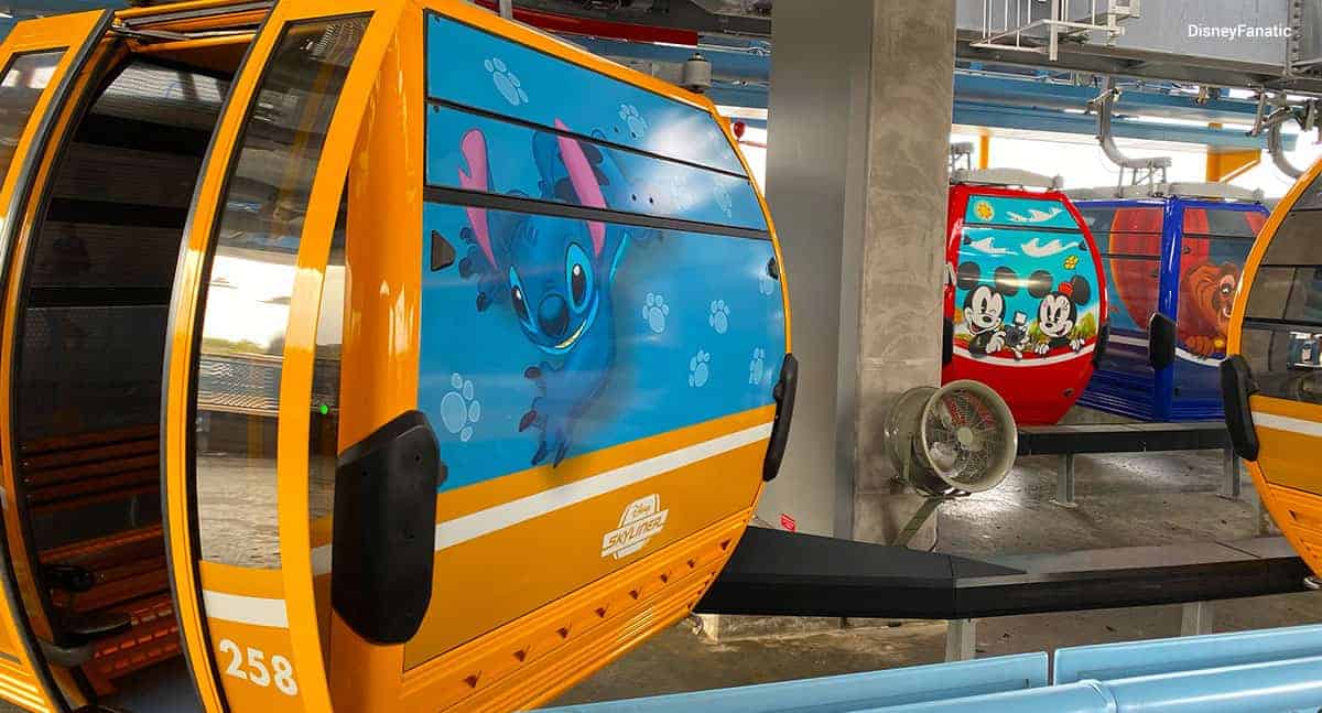 A Disney Skyliner gondola with Stitch on it.