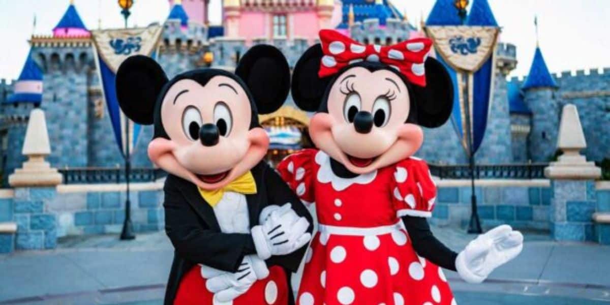Mickey Mouse and Minnie Mouse in front of Sleeping Beauty Castle at Disneyland Park