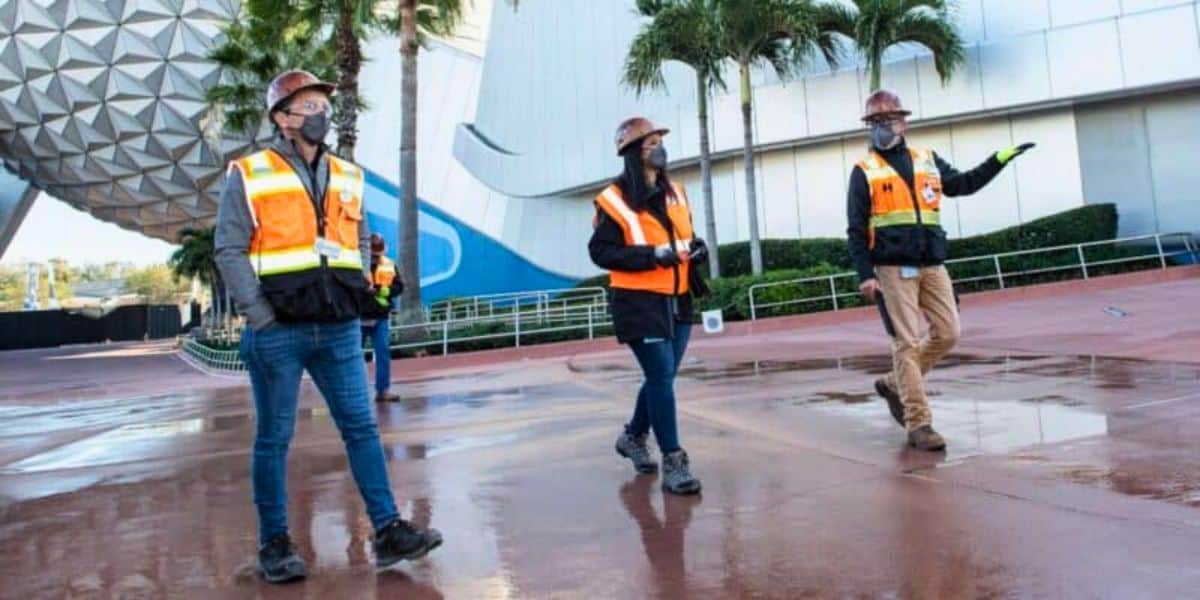 Barbara Bouza (middle) walking through EPCOT