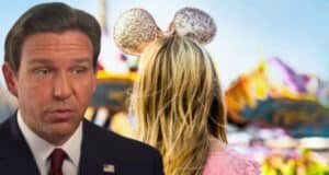 A man in a suit, who appears to be in the foreground, looks to the left with a concerned expression. In the background, a person with long blonde hair wears glittery mouse ears, facing away towards colorful amusement park rides.