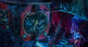 A vibrant, underwater-themed amusement park ride with two submarine pods filled with excited riders. The scene features red curtains, colorful lights, aquatic decorations, and an animatronic figure dressed in vibrant costume amidst the water-themed background.