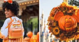 A boy holding a pumpkin wreath.