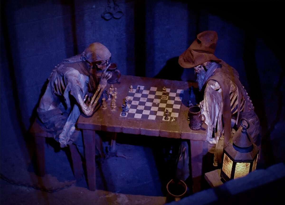 Two skeletons playing a game of chess in the queue for Pirates of the Caribbean at the Magic Kingdom