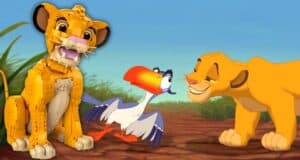 A 3D model of a lion cub, a cartoon bird, and a lioness are together on a savannah backdrop. The lion cub is made of interlocking bricks, the bird has a large orange beak, and the lioness is smiling.