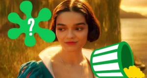 A woman with short dark hair and a blue dress stands outdoors at sunset, smiling slightly. A large green question mark and a green bucket are overlaid on the image.