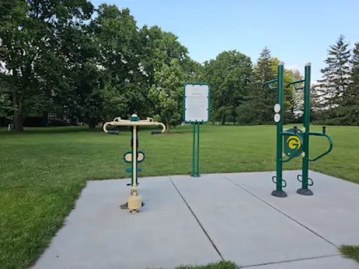 Outdoor exercise spot made by Duration Concrete Coatings by Duralast gives clear instructions for safe use in the park.