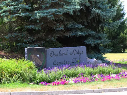 The Orchard Ridge Country Club sign shows work by Duration Concrete Coatings by Duralast, a trusted Fort Wayne company.