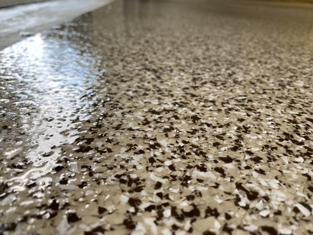 Garage floor with a smooth, durable finish by Duration Concrete Coatings by Duralast that is made to last and easy to clean.