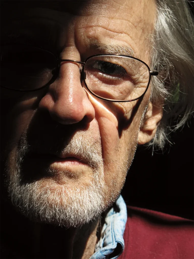a man with glasses and a beard