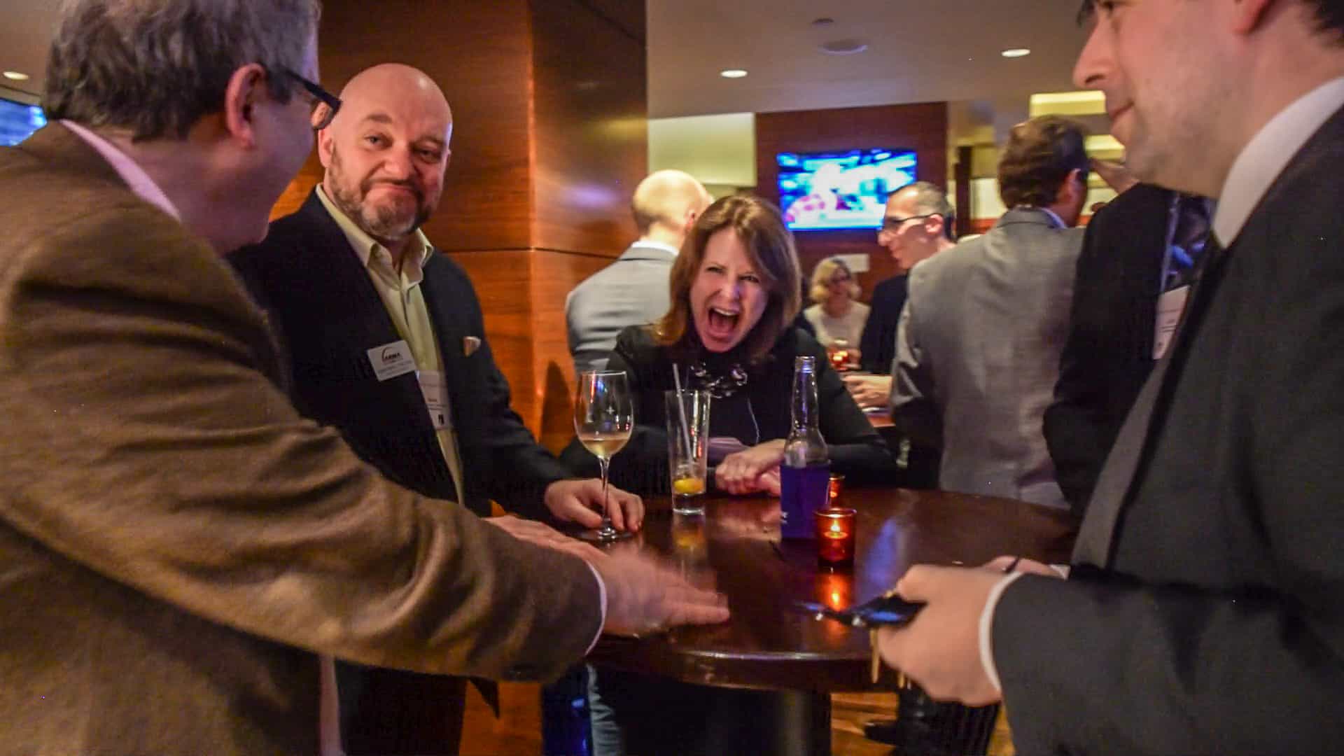 Interactive entertainment keeping guests engaged at a company welcome reception.