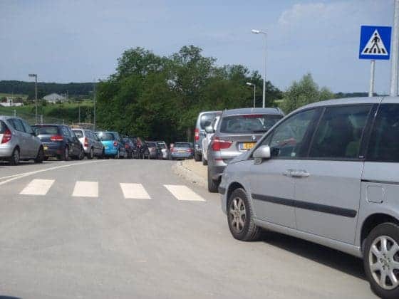 a group of cars on a road