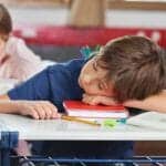 sleeping_child_in_the_school