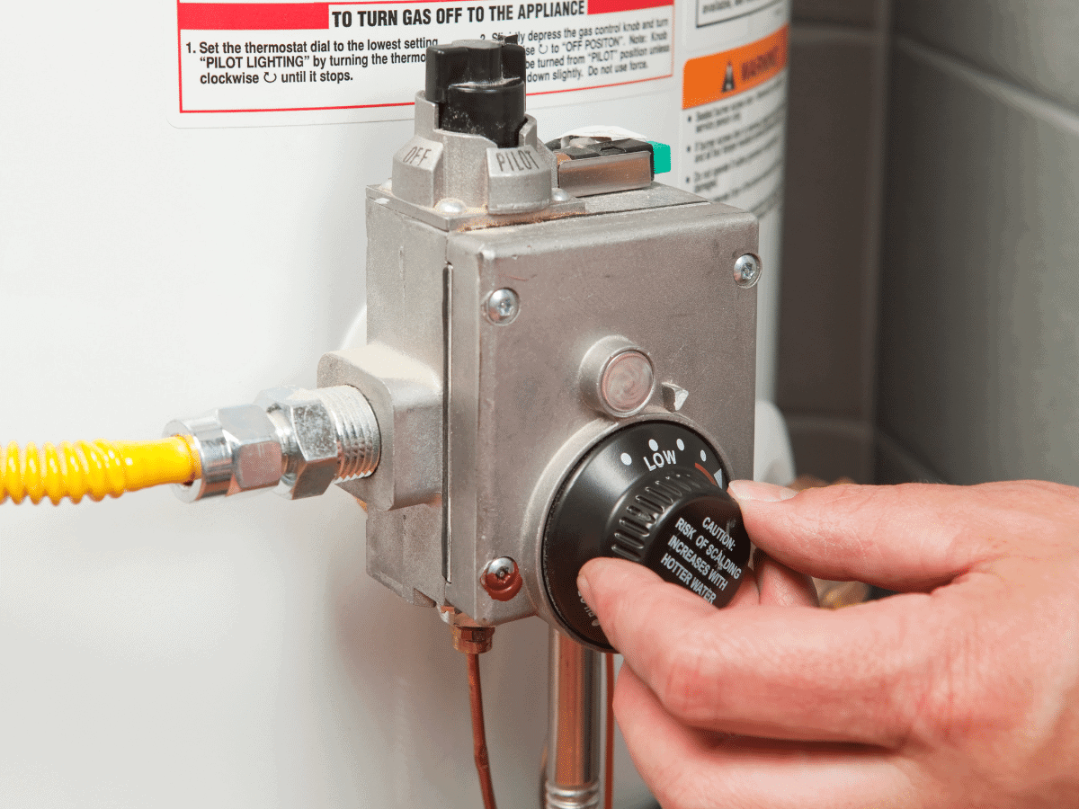 adjusting temperature on a traditional water heater
