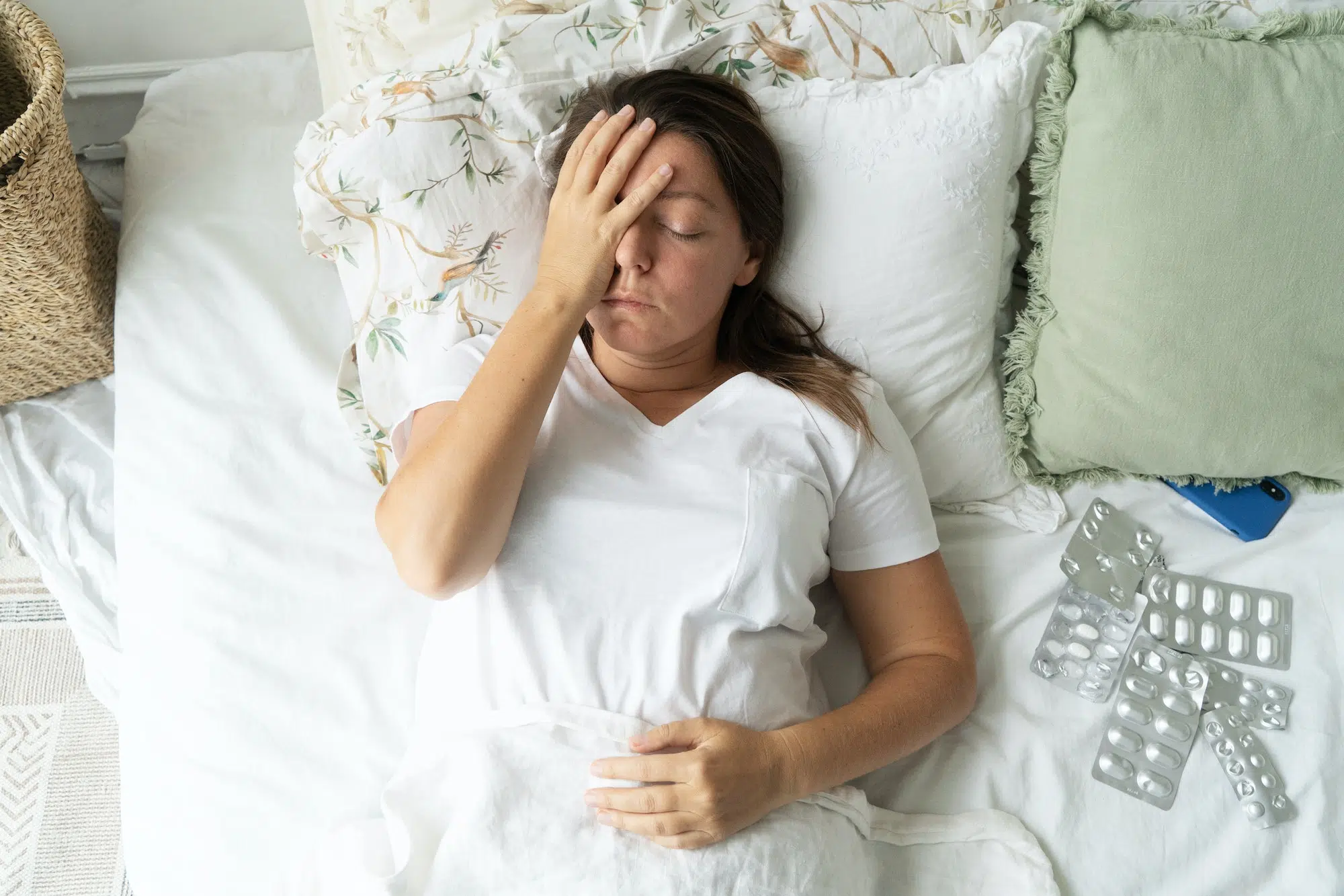 Sick woman in bed