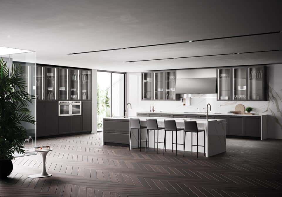 Modern kitchen with dark wood flooring, large island with bar stools, glass cabinets, built-in appliances, and minimalistic design.