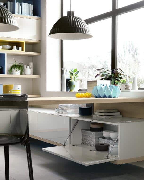 Modern kitchen interior with open shelving, a large window, and pendant lights.