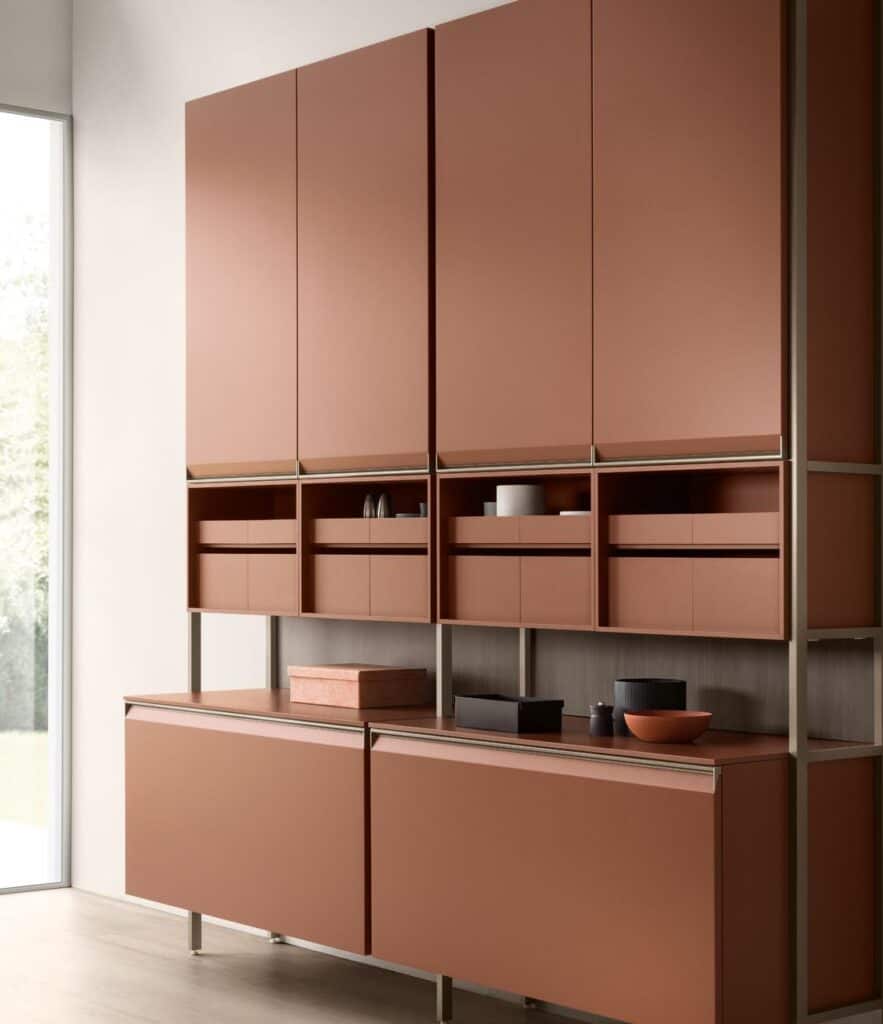 Modern brown wall cabinets with shelves and drawers in a minimalist interior.