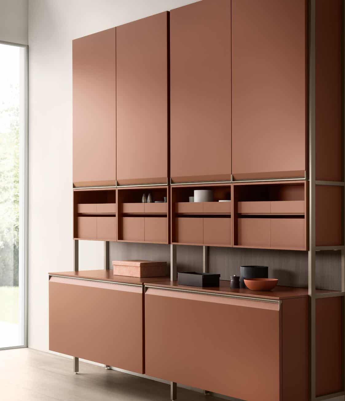 Modern brown wall cabinets with shelves and drawers in a minimalist interior.