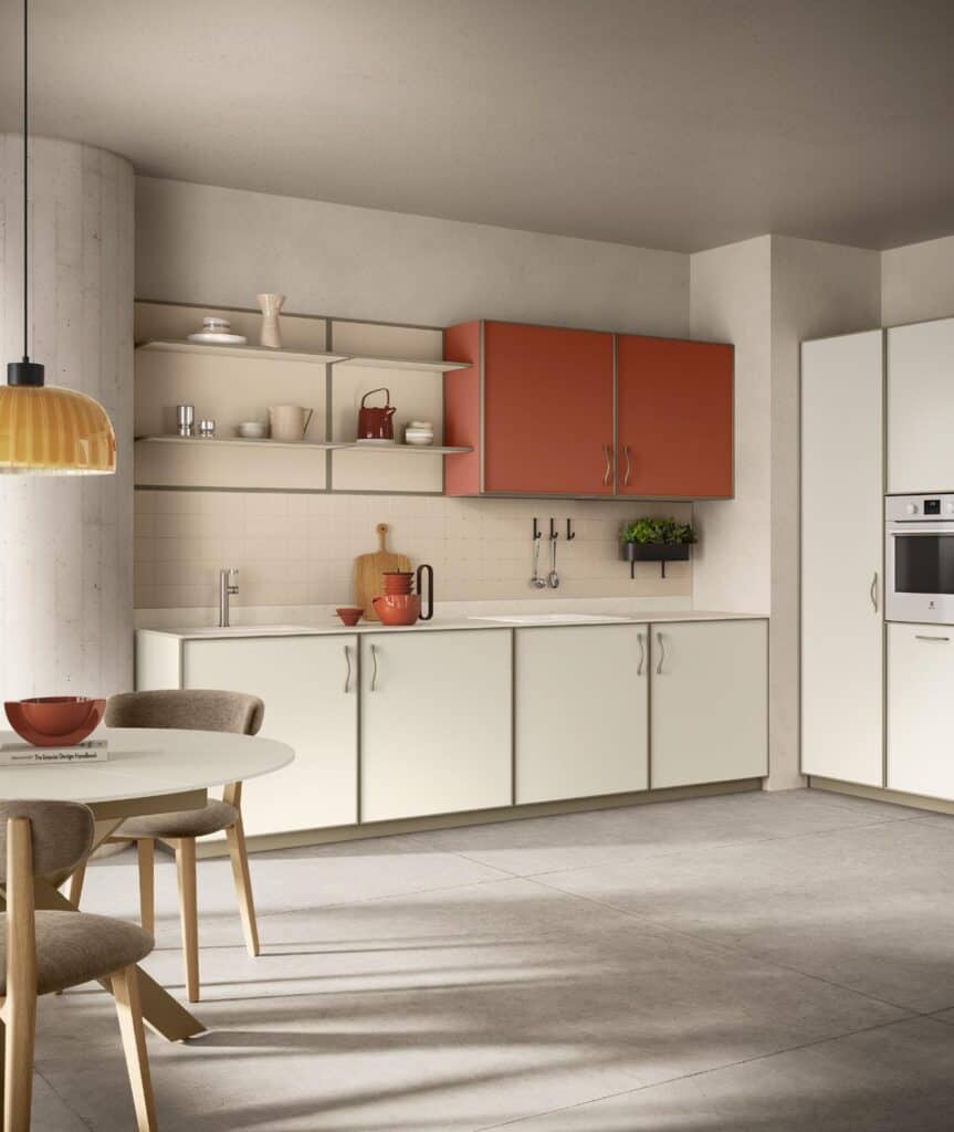 Modern kitchen with light-colored cabinets, open shelves displaying kitchenware, a round dining table with chairs, pendant light, and integrated appliances.