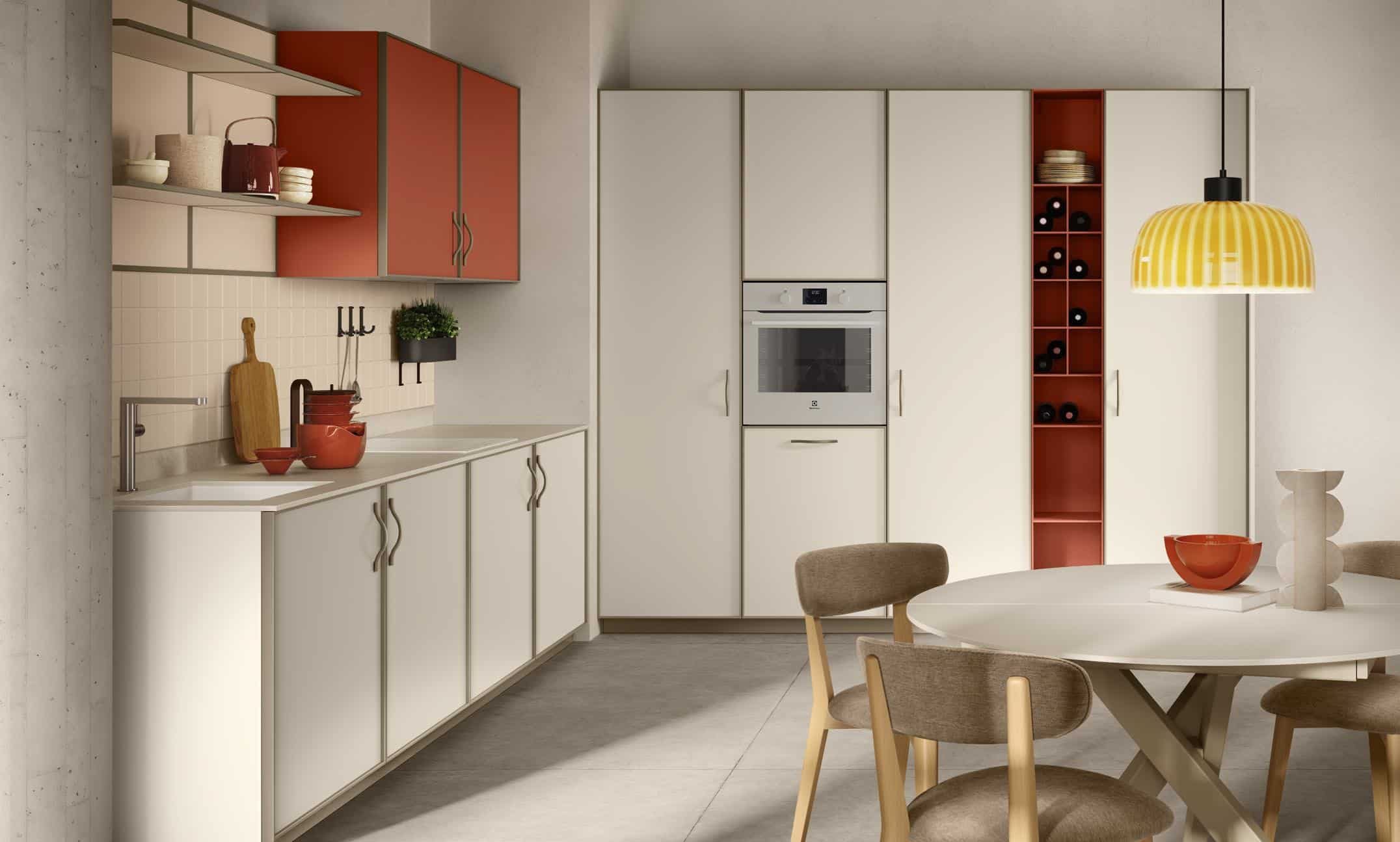 Modern kitchen with cream cabinets, red accents, open shelves, built-in oven, round dining table, beige chairs, and a yellow pendant light.
