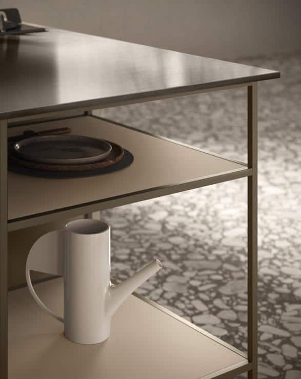 Modern kitchen shelving unit with a white ceramic jug on the lower shelf and a plate on the upper shelf.