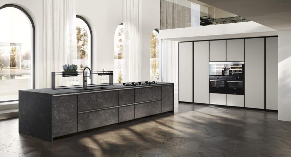 Modern kitchen with black island, minimalist cabinetry, built-in appliances, and large arched windows with sheer curtains.