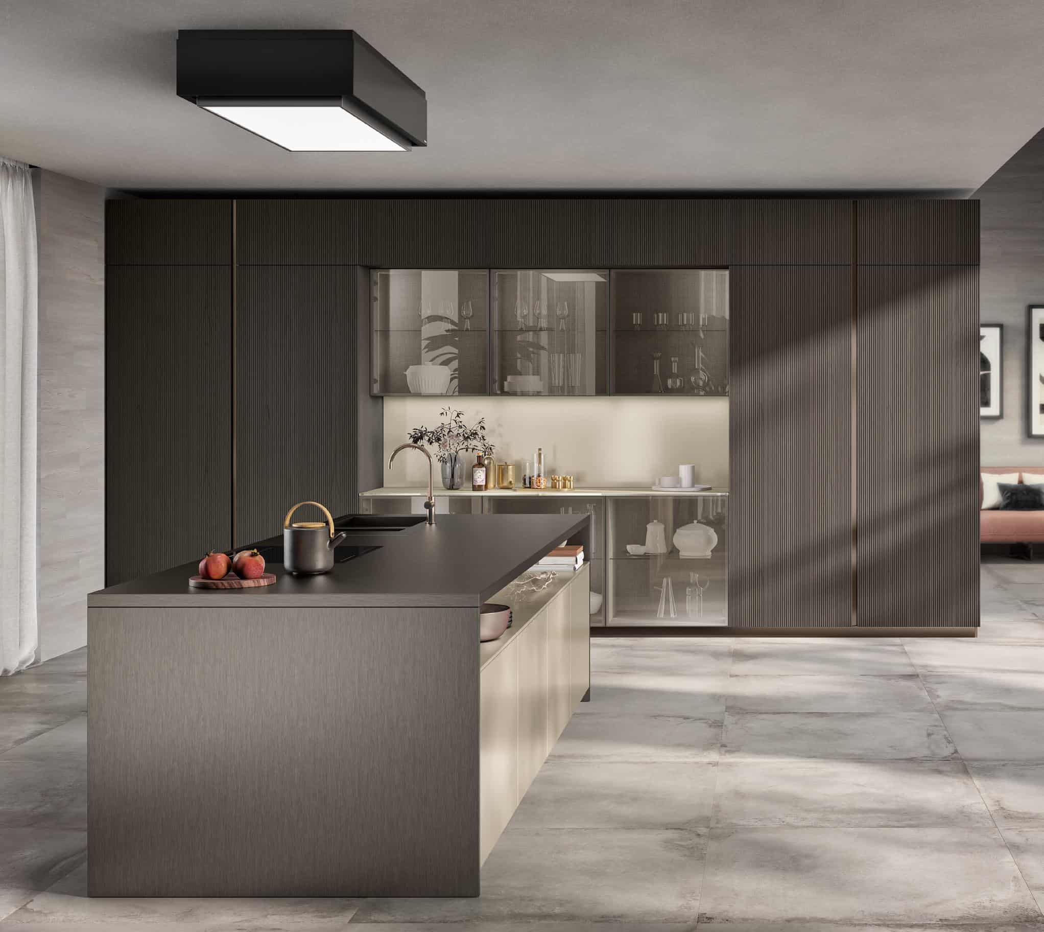 Modern kitchen interior with a large island, dark cabinets, and minimalist decor.