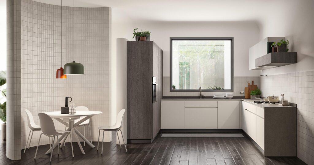 Modern kitchen with white cabinetry, dark wood accents, a round dining table with white chairs, colorful pendant lights, and a large window.