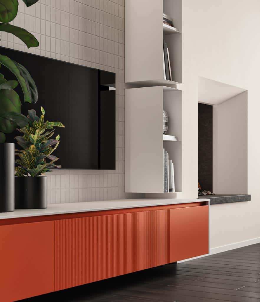 Modern living room interior with an orange cabinet, mounted TV, and light-colored shelving with books and decor items.