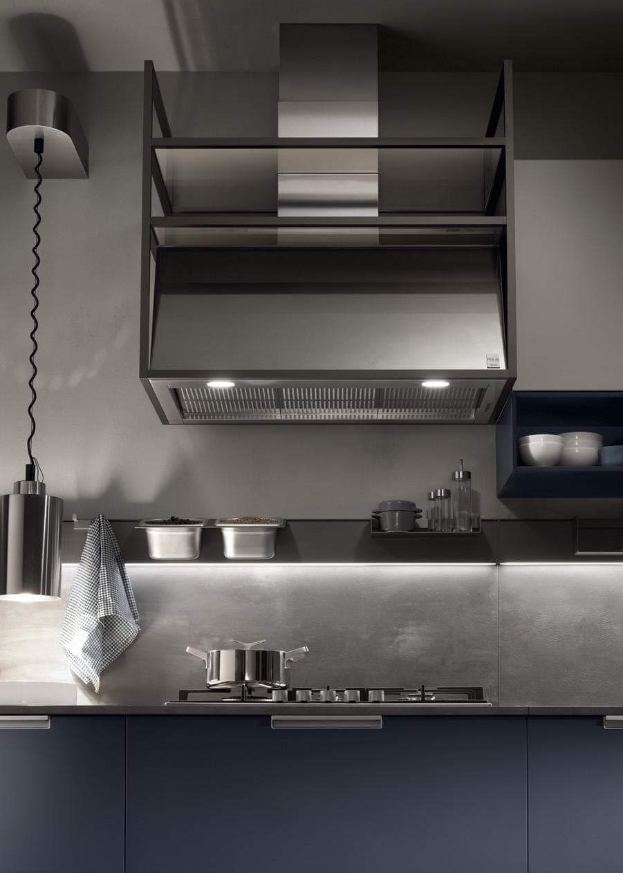 Modern kitchen with stainless steel appliances, dark cabinetry, under-cabinet lighting, and a metal range hood.