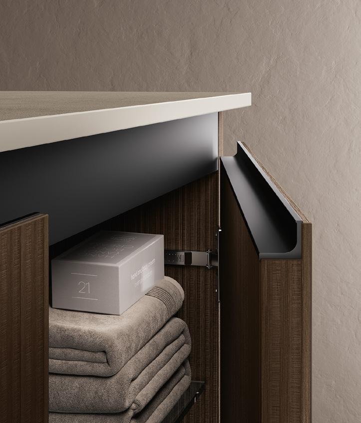 Open wooden cabinet with neatly stacked towels and a boxed item on a shelf.