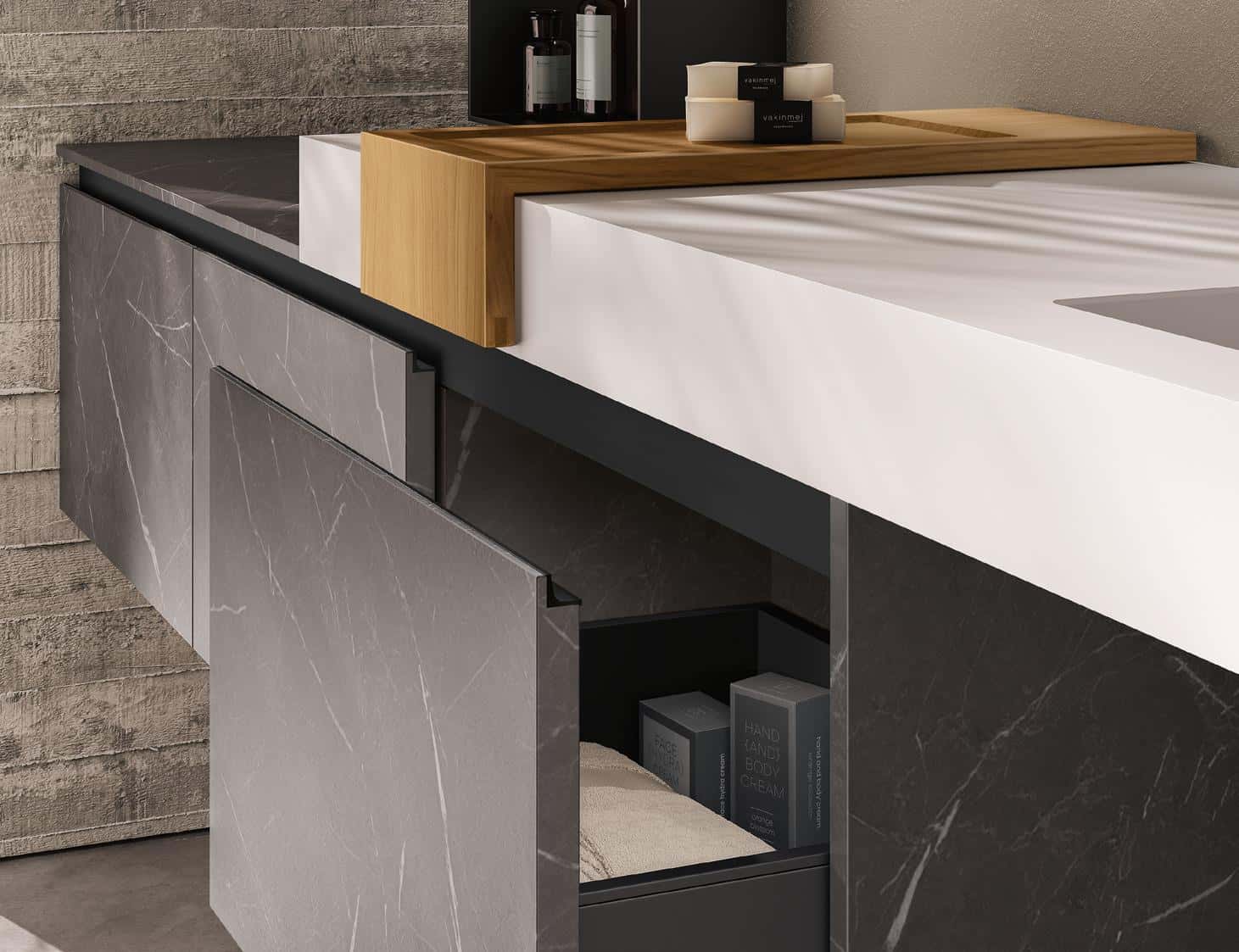 Modern bathroom vanity with concrete-like cabinets, a white countertop, wooden tray, and cosmetics.