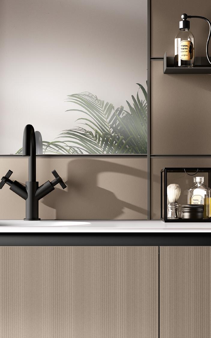 Modern bathroom sink with a black faucet, a mirror reflecting palm leaves, and a shelf holding a bottle and shaving accessories.