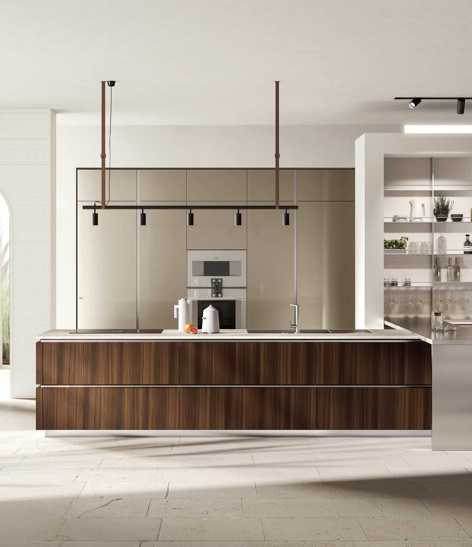 Modern kitchen interior with a large wooden island, pendant lighting, integrated appliances, and open shelving displaying kitchenware and plants.