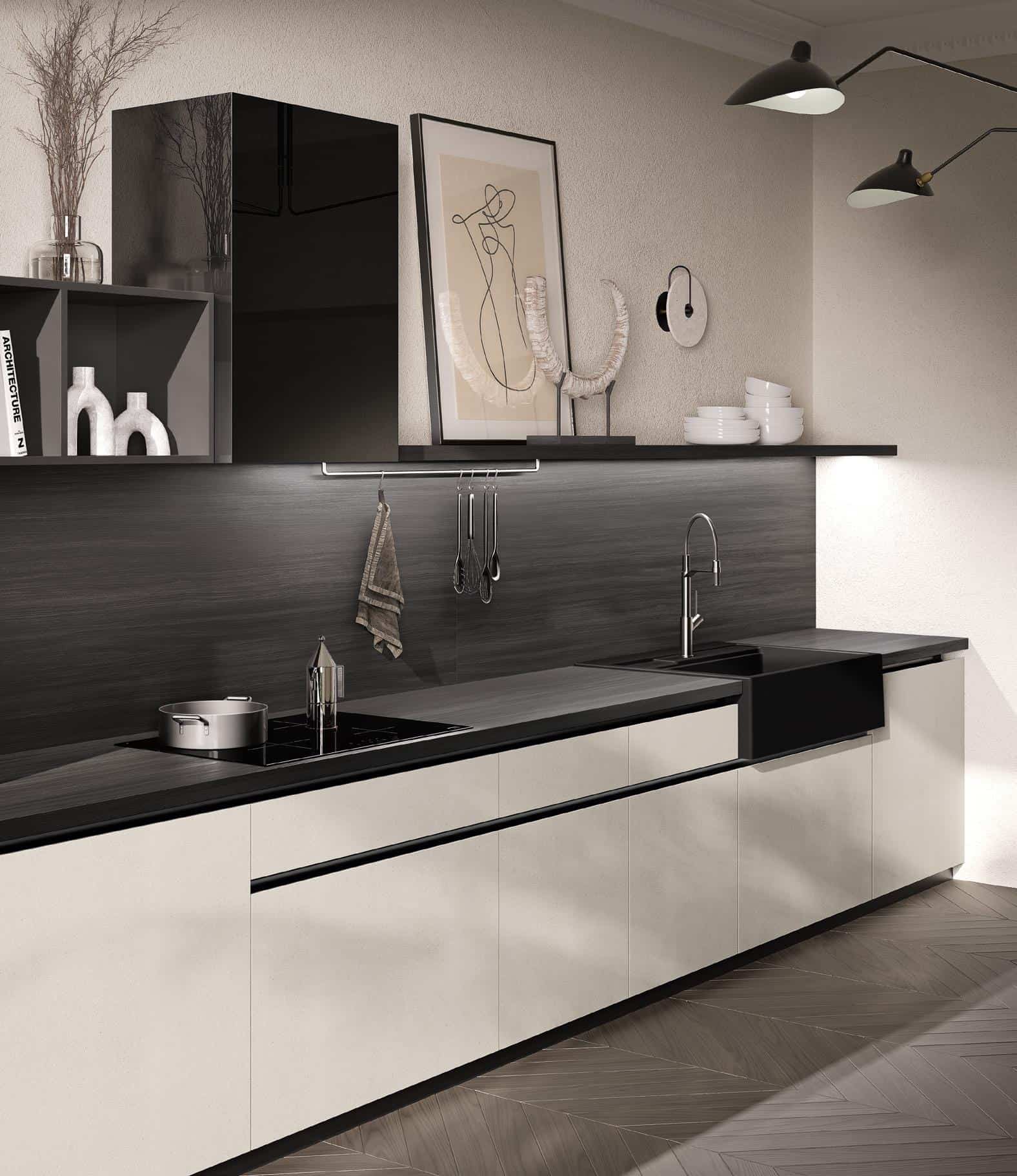 Modern kitchen interior with sleek white cabinets, black countertops, wall-mounted shelves, and minimalist decor.