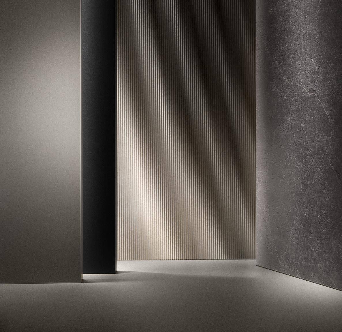 Minimalist interior with textured walls in shades of gray.