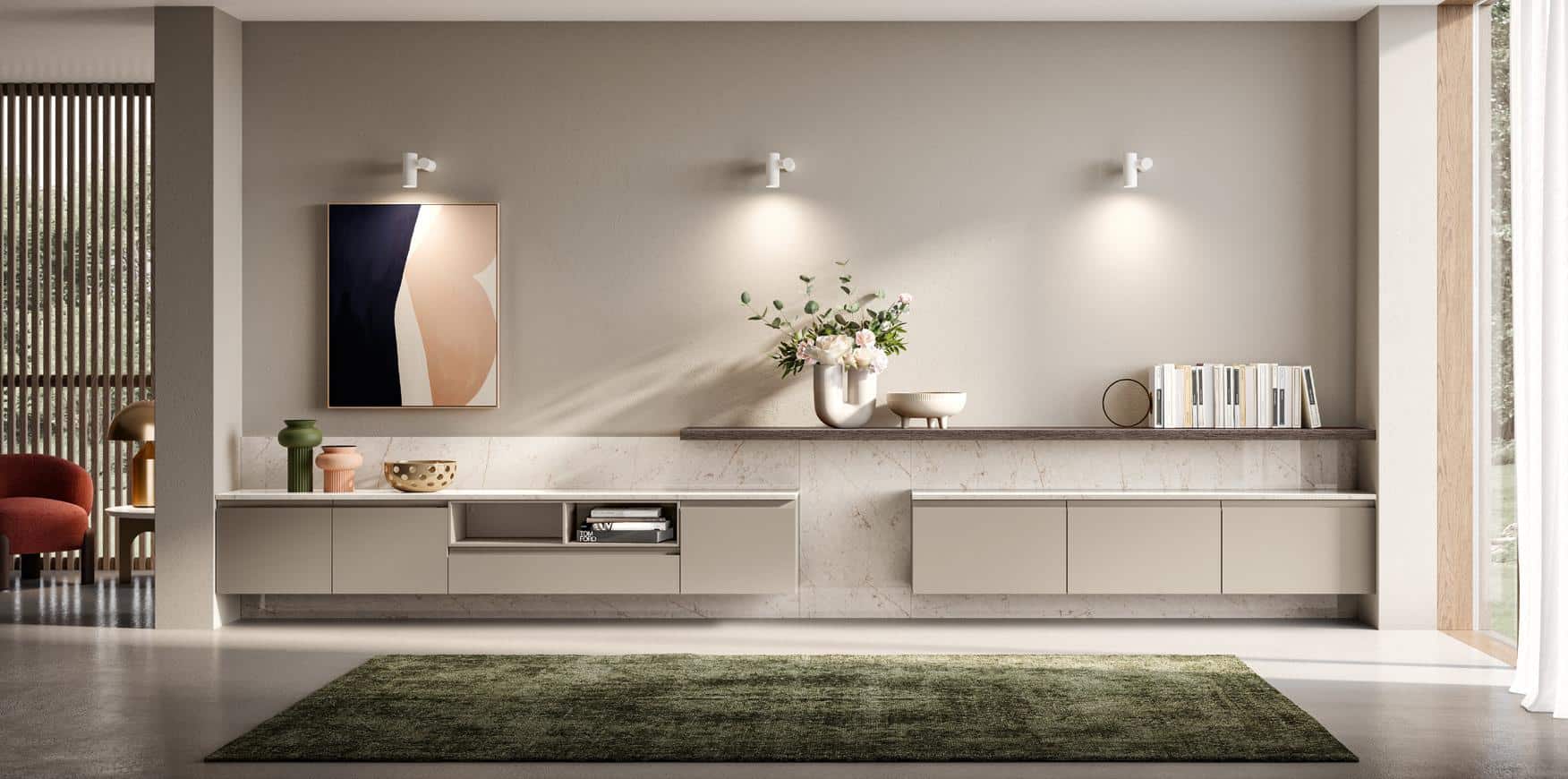 Modern living room with minimalist beige cabinets, abstract artwork, decorative vases, and a wall-mounted shelf with books, illuminated by wall sconces.