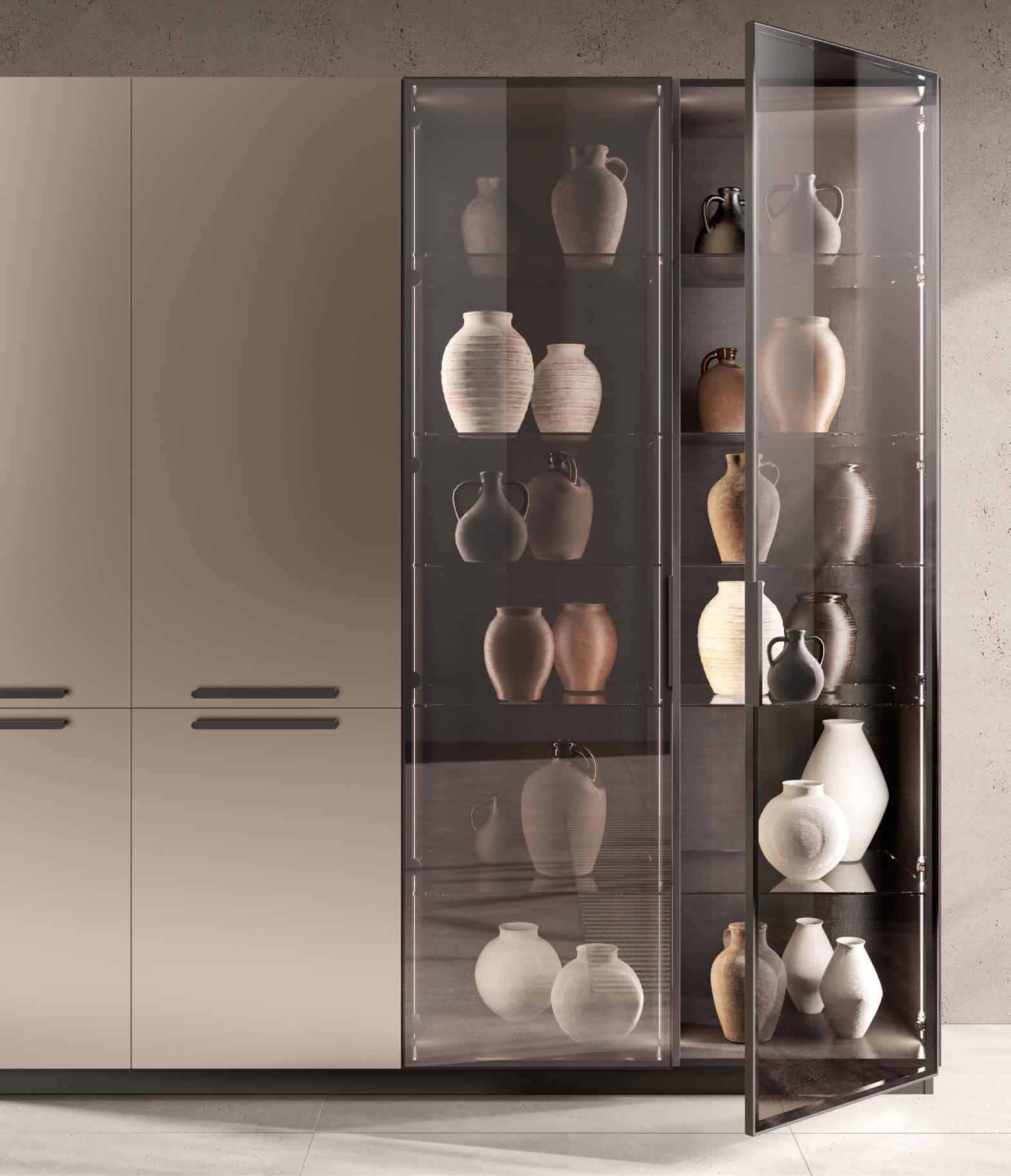 Modern cabinet with a glass door displaying an assortment of decorative vases on shelves.