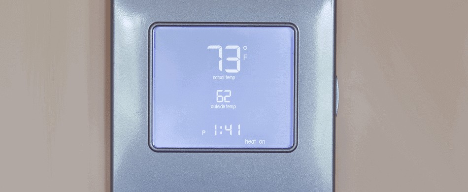Digital thermostat displaying an indoor temperature of 73°F, outdoor temperature of 62°F, and current time of 1:41.