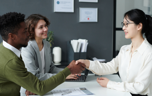 employer-shaking-hands-with-candidate-2023-02-10-10-02-04-utc