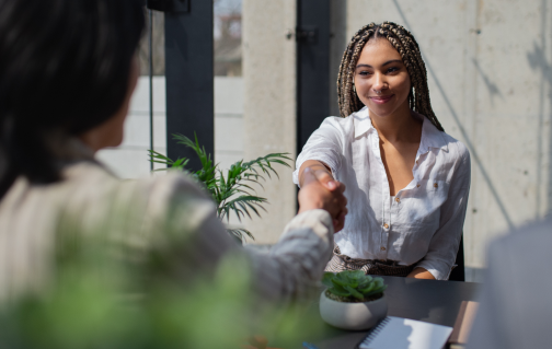 happy-young-woman-having-job-interview-in-office-2021-09-23-20-19-30-utc