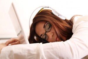 Lazy writer dozing on laptop