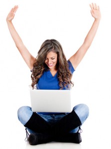 Happy woman with laptop