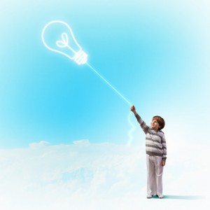 Child flies an idea kite