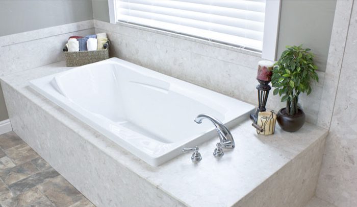 A bright, clean bathroom by Mid State Baths looks inviting and peaceful, making it a great spot to relax or get ready for the day.