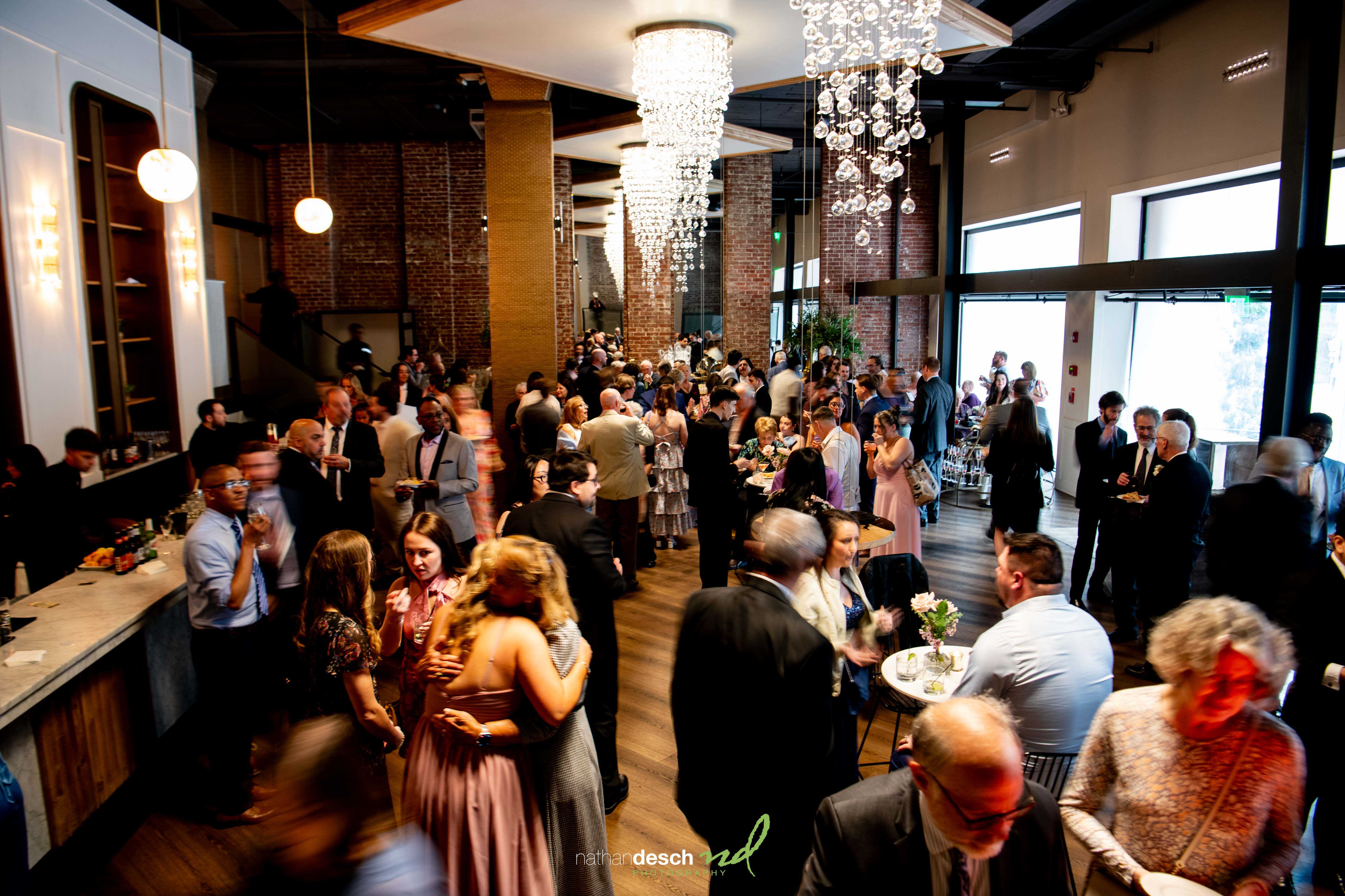 guests enjoying cocktail hour at tendenza