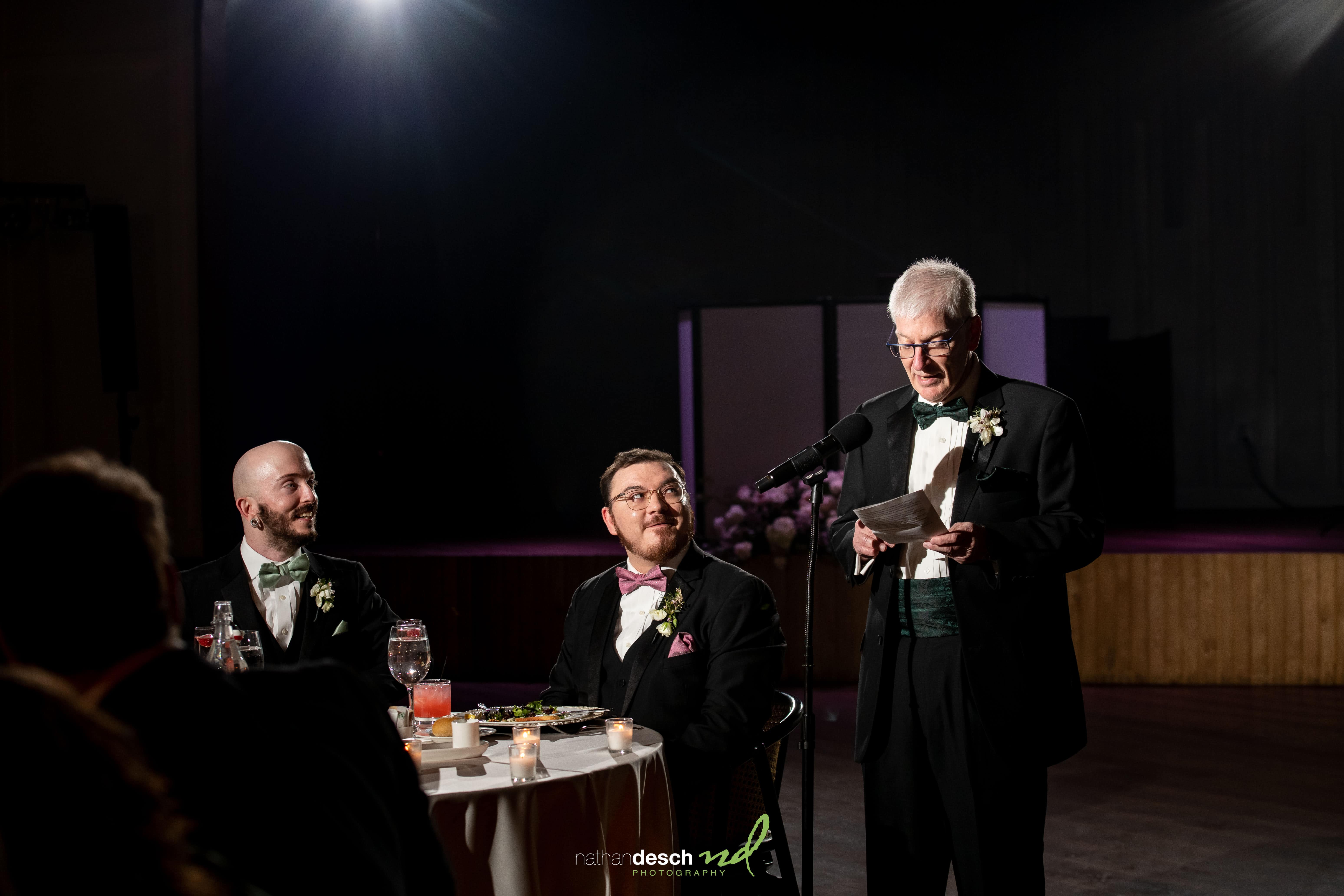 father of the groom giving a toast